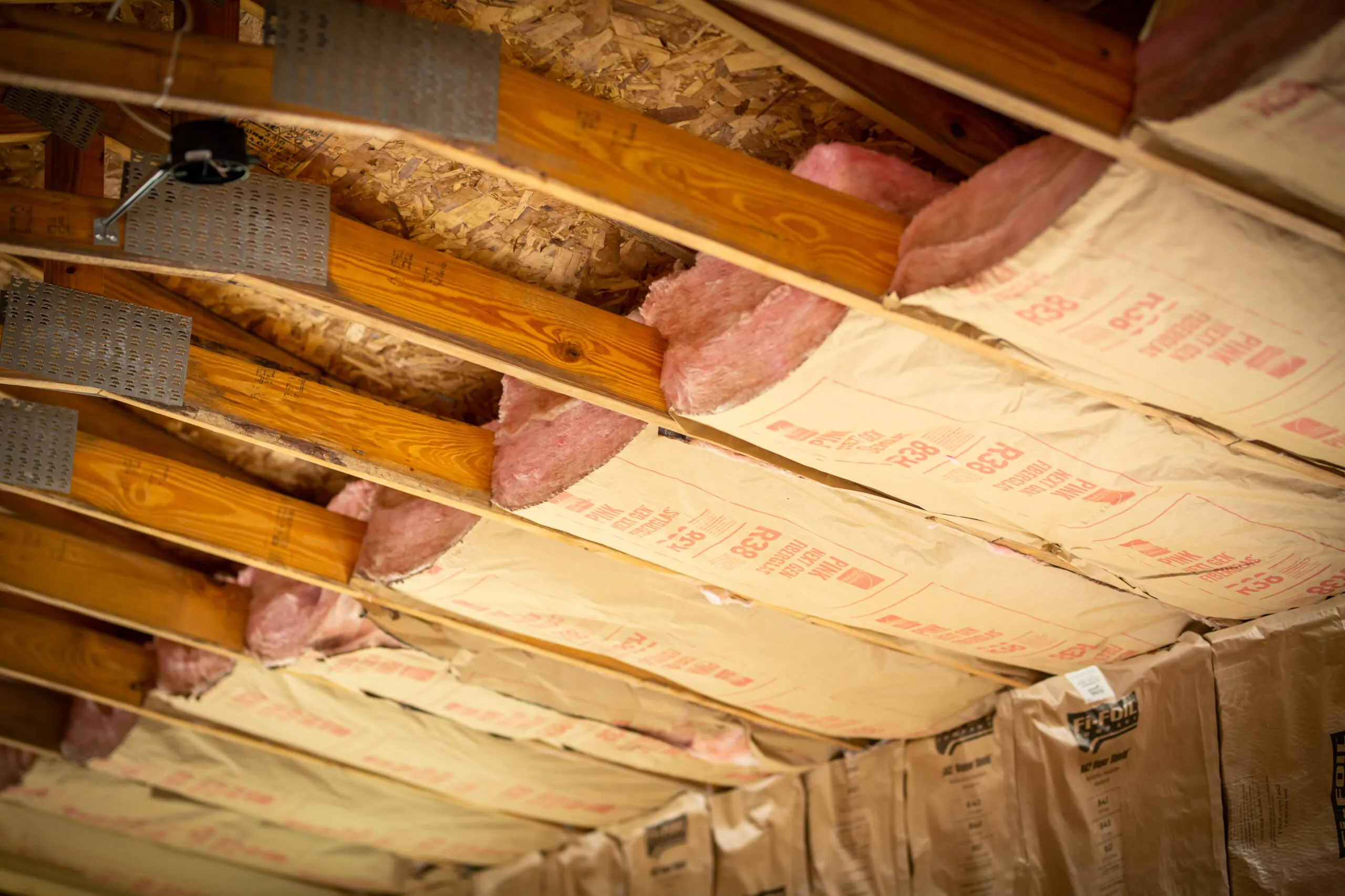 R-38 Fiberglass batts installed in an attic